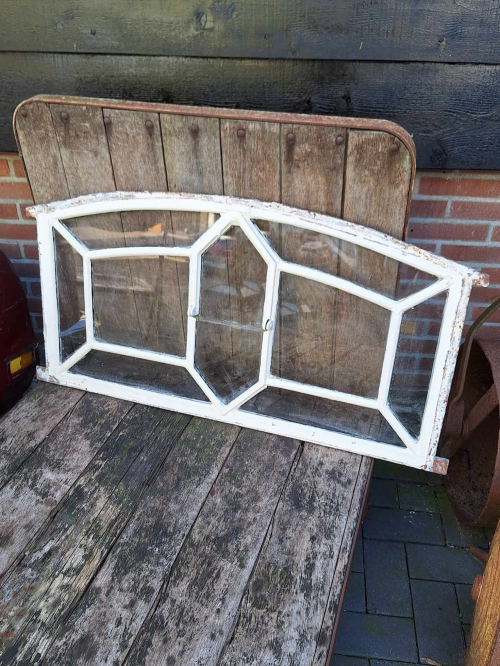 Large antique stable window with tilting window.